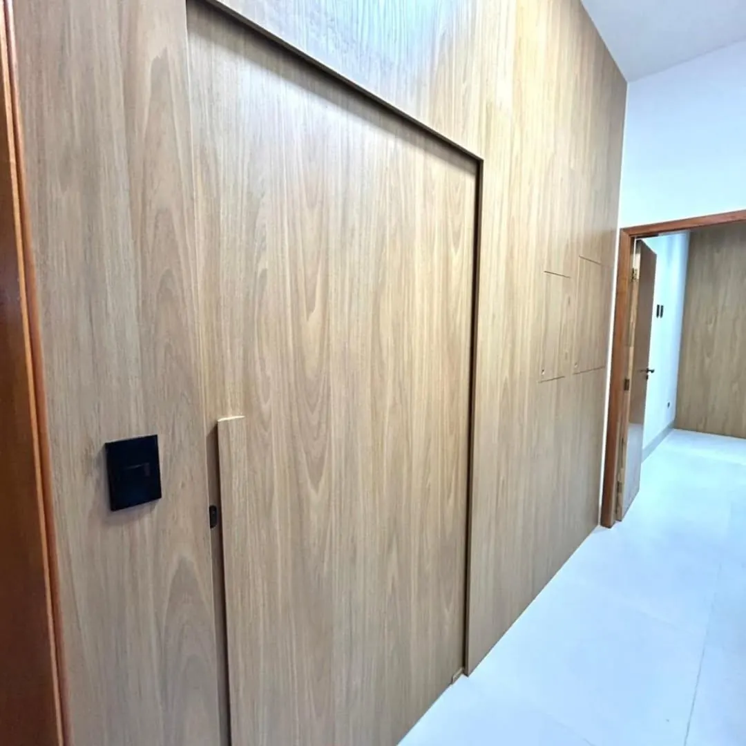 Painel de TV e sala planejada na obra Residencial Portinari, projeto da RW Móveis Planejados, foto 2